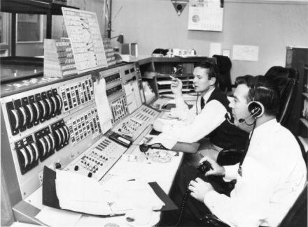 <p>Below: John Saxon (back) and Mike Dinn at the Honeysuckle Creek Operations Console during a pre-mission simulation for NASA’s Apollo 13, 1970</p>
<p>Canberra, Australia</p>
