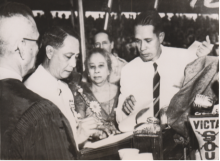 <p>Philippines President Manuel L. Quezon signs the Treaty of Manila, 1946<br />
Manila, Philippines</p>
<p>Newly elected president Manuel L. Quezon signs the Treaty of Manila establishing diplomatic relations between the United States and the Philippines following its independence. To his right is Chief Justice of the Supreme Court of the Philippines, Manuel Moran, along with Quezon’s wife, Trinidad Roxas, and General Douglas MacArthur behind her.</p>
<p>National Archives and Records Administration/<em>New York Times</em> Photos, Still Picture Unit, 306-NT-1192-A</p>
