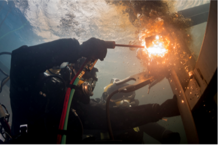 <p>U.S.-ROK underwater training exercises, 2017<br />
Changwon City, Republic of Korea<br />
Photograph by Chief Mass Communication Specialist Brett Cote</p>
<p>Sailors from the United States and the Republic of Korea collaborate in underwater training exercises. In this image, Equipment Operator 3rd Class Thomas Dahlke, assigned to the underwater construction team, cuts a piece of steel in a training pool at the Naval Education and Training Command in Jinhae, Changwon City.</p>
<p>U.S. Navy Combat Camera/Released</p>
