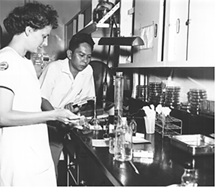 <p>Medical Technician Mary Jo Ann Crary with an Indonesian colleague in the lab, 1960<br />
Sumbawa Besar, Indonesia</p>
<p>Project HOPE (Health Opportunities for People Everywhere) was founded in 1958 as an international health care organization and has since served in over 100 countries. On its maiden voyage, SS <em>HOPE</em>—the world’s first peacetime hospital ship—traveled to Indonesia and Vietnam, where its volunteer medical staff treated patients with limited access to health care and health education.</p>
<p>Project HOPE</p>
