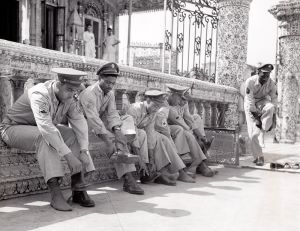 <p>U.S. soldiers respectfully remove shoes before entering the Calcutta Jain Temple, 1943<br />
Calcutta, West Bengal<br />
Courtesy of the National Archives at College Park, MD, Still Picture Unit,<br />
208-AA-45-AEF-HH-2</p>
