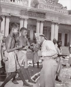 <p>Henry Armstrong gives an impromptu boxing lesson to local Indian youth, 1945<br />
Calcutta, West Bengal<br />
Photograph by Corporal James W. Guillot<br />
Courtesy of the National Archives at College Park, MD, Still Picture Unit,<br />
111-SC-264-1963-204195-S</p>
