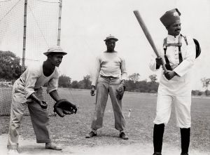 <p>American soldiers teach baseball to an Indian policeman, 1943<br />
Location in India unknown<br />
Courtesy of the National Archives at College Park, MD, Still Picture Unit,<br />
208-AA-45-AEF-AA-1</p>
