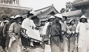 <p>Alice Roosevelt entering the Forbidden City, 1905<br />
Beijing<br />
Photograph by Henry Fowler Woods<br />
Courtesy of Henry Fowler Woods, Photograph Albums of a Diplomatic Mission to Asia and Travel to Burma, India, Egypt, and Greece, General Collection, Beinecke Rare Book and Manuscript Library, Yale University, GEN MSS 653 Box 6</p>
