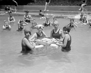 <p>American women playing a floating game of Mah-Jongg, c. 1924<br />
Location in the U.S. unknown<br />
Courtesy of the Library of Congress, Prints and Photographs Division, LC-DIG-npcc-11609</p>

