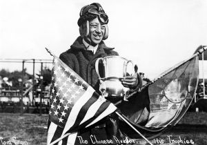 <p>Tom Gunn (Tan Gen) with his trophy at the International Aviation Meet, 1910<br />
Los Angeles, California<br />
Courtesy of the Smithsonian National Air and Space Museum, NASM 79-10048</p>
