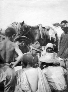 <p>Major Joseph Stilwell (Shi Diwei) conferring with famine-relief road workers, 1921<br />
Shanxi Province<br />
Courtesy of Colonel John Easterbrook</p>
