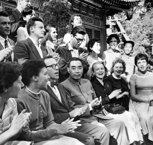 <p>Premier Zhou Enlai claps along with an American youth delegation singing “Ain’t Gonna Study War No More,” 1957<br />
Beijing<br />
© Bettmann/CORBIS, BE045871</p>
