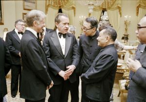 <p>Presidents Jimmy Carter and Richard Nixon with Vice Premier Deng Xiaoping at a White House state dinner, 1979<br />
Washington, D.C.<br />
White House Photograph by Bill Fitz-Patrick<br />
Courtesy of the Jimmy Carter Presidential Library, nlc09162.18</p>
