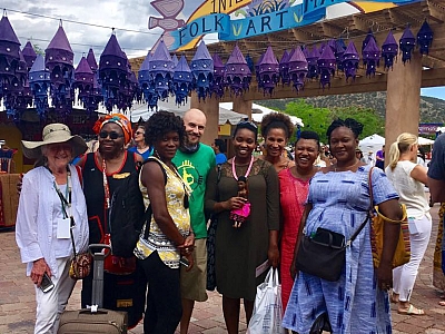 2017 AWEP participants in the fashion sub-group volunteering at the International Folk Art Market in Santa Fe, New Mexico