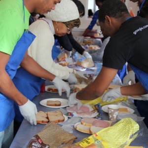 Members of the community make sandwiches for Martha’s Table, a DC nonprofit.
