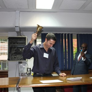 American Mentor Sean Murphy rings the bell to open the Zimbabwe Stock Exchange