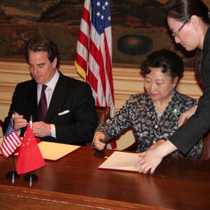 Ambassador Stuart Holliday and Chinese Vice Minister of Culture, Madame Zhao Shaohua, sign a Memorandum of Understanding between Meridian and the China International Culture Association.