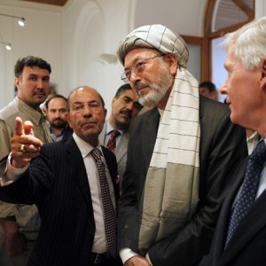 U.S. Ambassador Ryan Crocker, Afghan Second Vice President Karim Khalili, and Minister of Information and Culture Sayed Makhdoom Raheen admire photos at the opening of n Small Things Remembered in Kabul, Afghanistan on Thursday September 08, 2011. (Barat Ali Batoor/Department of State)