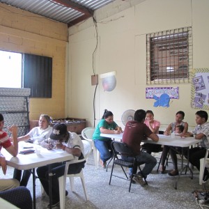 Participants work on developing ideas and designs for the mural