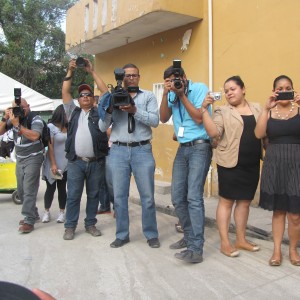Press at the public unveiling of the mural