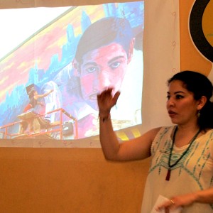 Michelle presents a workshop on her past mural arts background