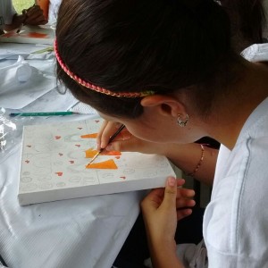 Participants painted scenes that reflected their idea of peace and social inclusion