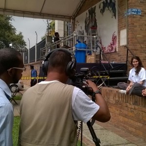 Augustina and one of her assistants being interviewed