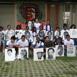 The adult workshop participants with their paintings