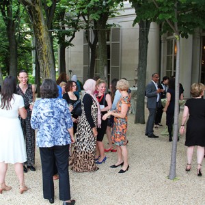 Guests enjoy the reception in the Linden Grove.