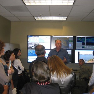 Tour of the Port of Long Beach Command Center From left to right: Ms. Rhonda Sinkfield (OMB);  Ms. Leila Afas;  Ms. Gilka Rosenthal-Larrea(interpreter);  Ms. Claudia Glen Vargas; Capt. Norberto Castañeda López; Mr. Michael McMullen, Lead Program Manager, Security Division, Port of Long Beach