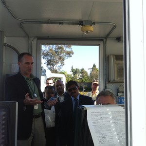 Mr. Bryan Rockwood, Vice President and Director of Marketing explains the data received by the scanning demonstration at the SAIC facility in San Diego Left to right: Mr. Bryan Rockwood (Vice President and Director of Marketing, Security & Transportation Technology (STT) Business Unit), Mr. G. Krishna Kumar, Mr. G.V.L. Satya Kumar, Mr. Atulya Misra and Mr. Bernard Groseclose (Industry Specialist, Meridian International Center)