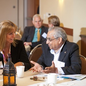 Ms. Mary Bennett, Director of Business Development of UltraSystems Environmental, speaks with Mr. Arjun Jain, CEO of Micro USA, Inc., during the Business Briefing in San Diego, CA