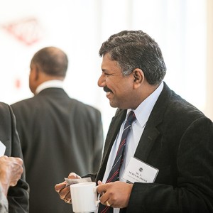Delegation leader Mr. N. Muruganandam exchanges business cards with U.S. companies at Business Briefing in San Diego, California