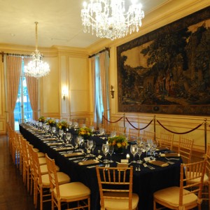 An antique dining table, original to the property, seats up to 30 guests, and is suitable for intimate corporate dinners and roundtable discussions.