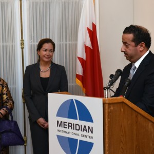 Ambassador Al Khalifa speaks to guests at Shaikha Mai and Lee Satterfield look on.