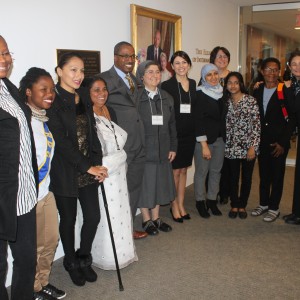 IWOC Awardees take a picture with the Dean of the Elliott School of International Affairs Ambassador Reuben E. Brigety, II