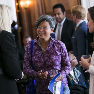 Ann Mei Chang, former Chief Innovation Officer and Executive Director of USAID’s Global Development Lab, greets Dr. Ruth Goodwin-Groen, Managing Director of the Better Than Cash Alliance, before the forum begins. Photo by Kristoffer Tripplaar.