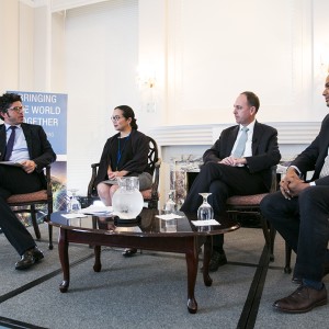 From left, Simone di Castri moderates a conversation on RegTech with R2A leaders Pia Roman, Head of Inclusive Finance Advocacy Staff at Bangko Sentral ng Pilipinas; Michael Wiegand, Director of Financial Services for the Poor at the Bill & Melinda Gates Foundation; and Kabir Kumar, Director of Policy and Ecosystem Building at Omidyar Network. Photo by Kristoffer Tripplaar.