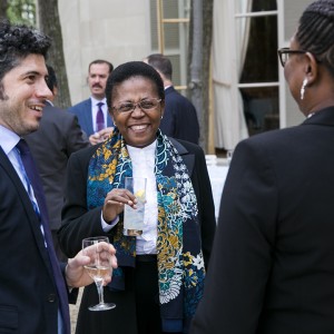 From left, Simone di Castri and Esselina Macome, policy advisor and former member of the Board of the Central Bank of Mozambique, engage in conversation with Dr. Claire Nelson, founder and president of the Institute of Caribbean Studies. Photo by Kristoffer Tripplaar.