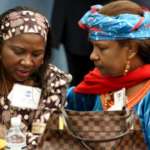 Mozambique’s Minister of Work, Employment and Social Security Vitoria Diogo shares a moment with Mariama Bayard-Gamatié, a Nigerien politician and women’s rights activist.