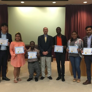 Pensacola city-split participants are presented with honorary citizenship certificates at City Hall in Pensacola, FL