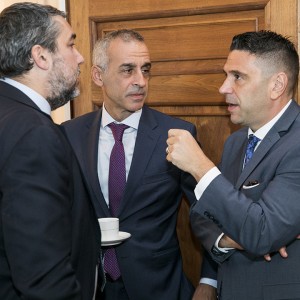 Deputy Chief of Mission of the Embassy of Argentina Gerardo Díaz Bartolomé (right) connects with counterparts. Photo by Kristoffer Tripplaar.