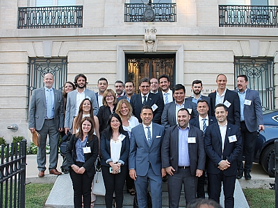 Participants took a group photo in front of the embassy of Argentina in Washington D.C.