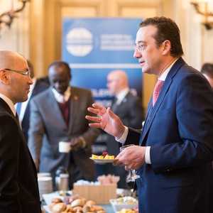 His Excellency Javlon Vakhabov of Uzbekistan (Left) converses with His Excellency David Bakradze of Georgia (Right) prior to Washburne’s presentation. Photo by James O’Gara.