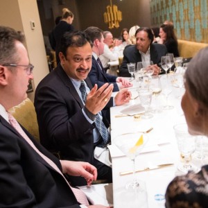 Meridian Global Leadership Council members engage in discussion during the dinner at Punjab Grill.