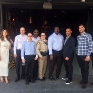 Visitors from the MRP International Peace & Security visit with the Las Vegas Metropolitan Police Department to discuss coordinated efforts in vice investigations.