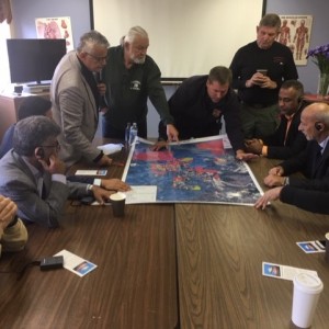 IVLP Visitors looking of an area map at Yavapai County Office of Emergency Management