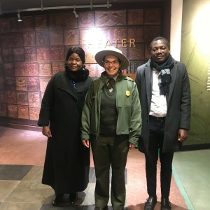 IVLP participants standing with their tour guide at the African Burial Ground in NYC