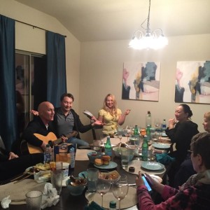 IVLP visitors enjoy home hospitality and singing in Austin, Texas.