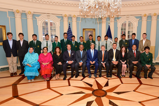 U.S. Secretary of State John Kerry, Special Representative for Afghanistan and Pakistan Dan Feldman, Ambassador of Pakistan to the United States Jalil Abbas Jilani, and Meridian’s President Ambassador Stuart Holliday pose for a photo with students from Pakistan's Army Public School and Degree College in Peshawar, at the U.S. Department of State in Washington, D.C., on July 27, 2015. Photo credit: U.S. Department of State