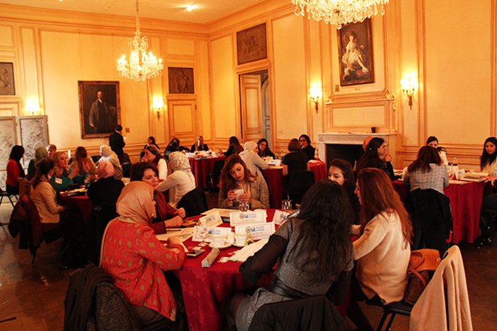 The group discussed shared challenges in the stately Meridian House Dining Room. 