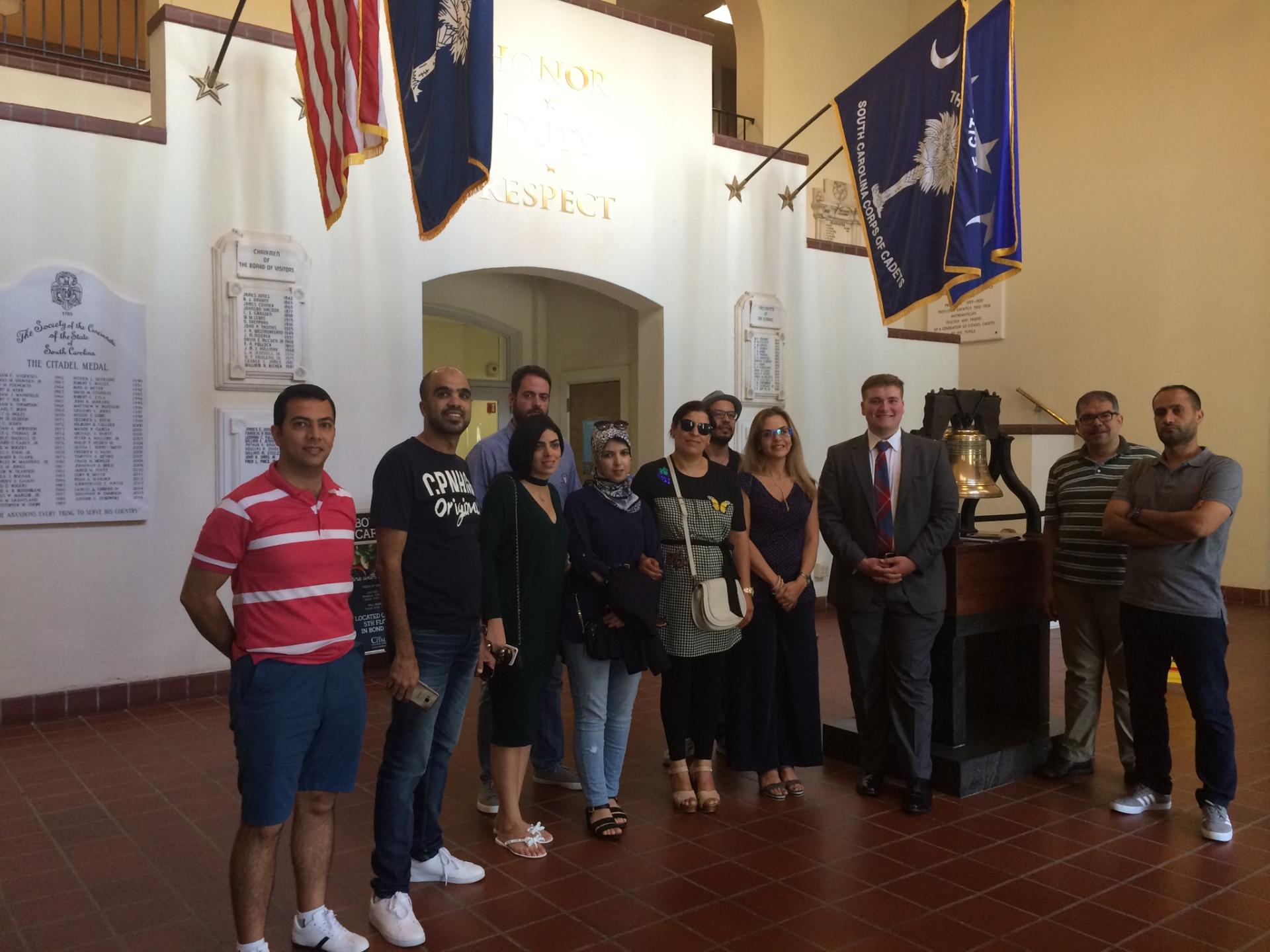 Voices of Reason IVLP participants take a group photo with Cadet Truesdale at the Citadel in Charleston, South Carolina