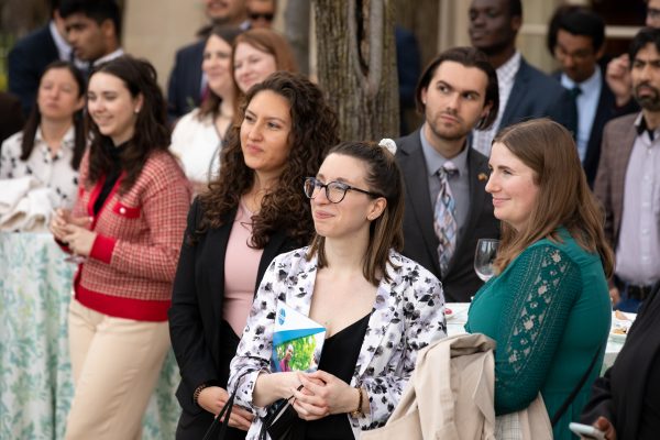 College students and young professionals listen to remarks at the “Careers in International Affairs Networking” reception after engaging with U.S. Foreign and Civil Service Officers and other international affairs professionals.