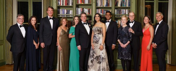 (Left to Right): Andrew and Heather Florance, Governor Glenn Youngkin and Suzanne Youngkin, Gwen Holliday and Ambassador Stuart Holliday, Ritu Ahuja Khanna and Congressman Ro Khanna, The Honorable Ann Stock and Stuart Stock, Sydney and Chris Nassetta.